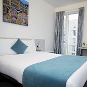 Bedroom at Elm Grove Conference Centre - Roehampton Venues